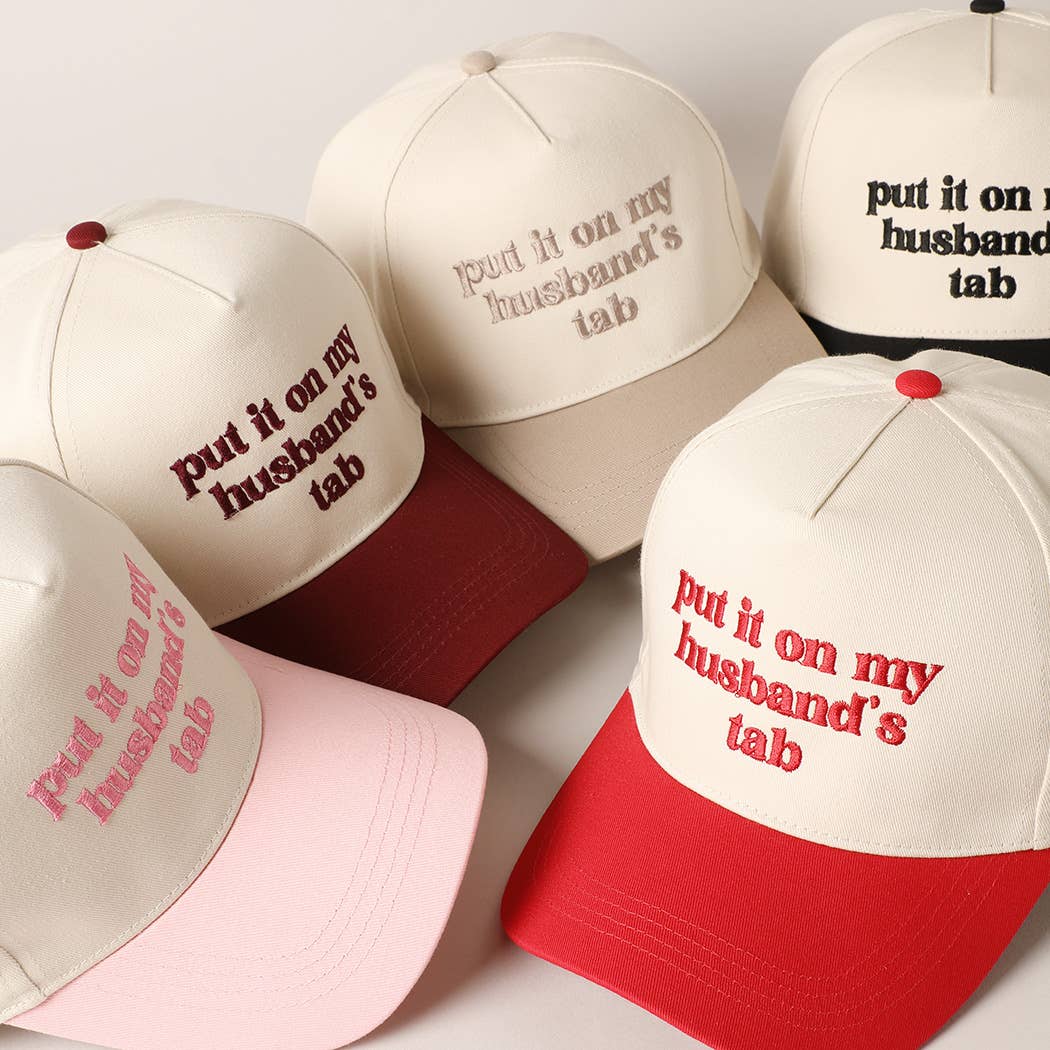 Put it on my husband's tab Trucker Hat