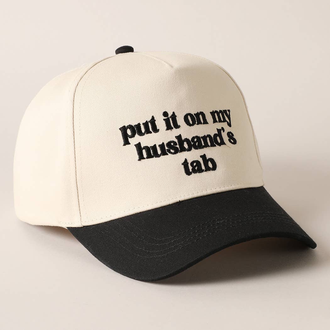 Put it on my husband's tab Trucker Hat