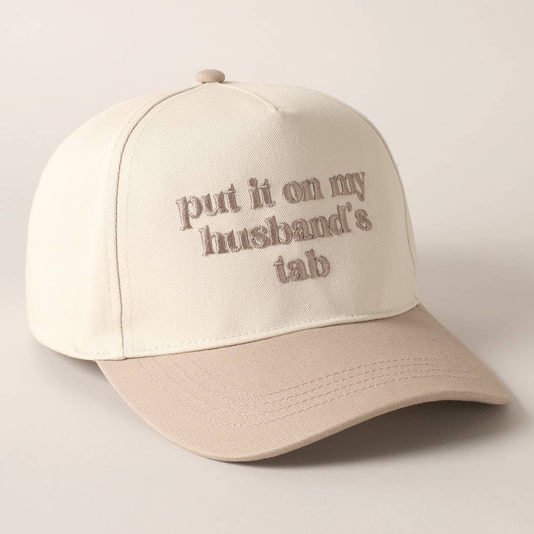 Put it on my husband's tab Trucker Hat