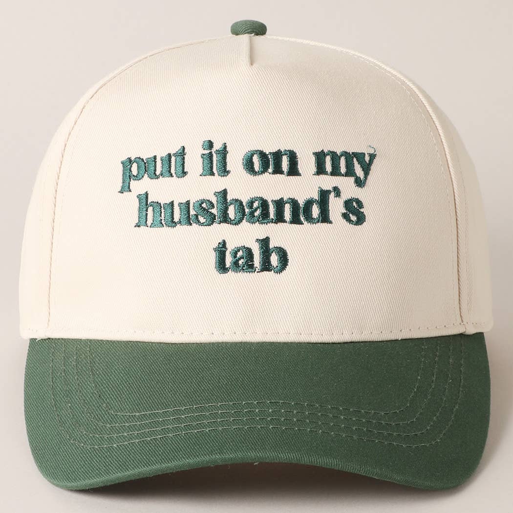 Put it on my husband's tab Trucker Hat