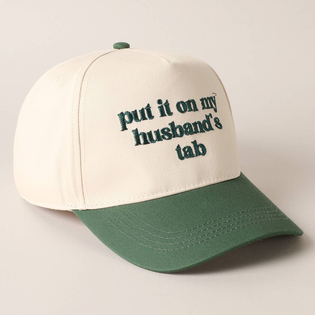 Put it on my husband's tab Trucker Hat