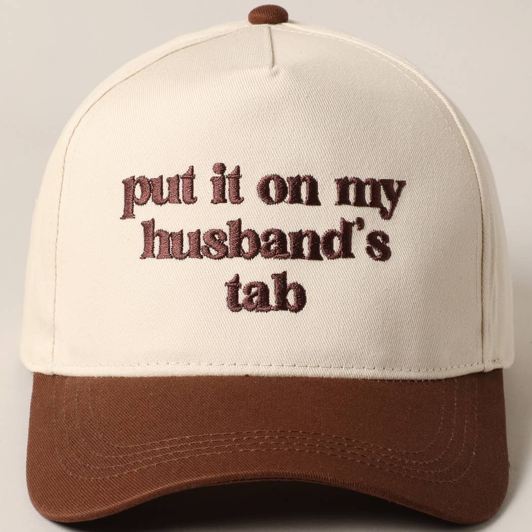 Put it on my husband's tab Trucker Hat