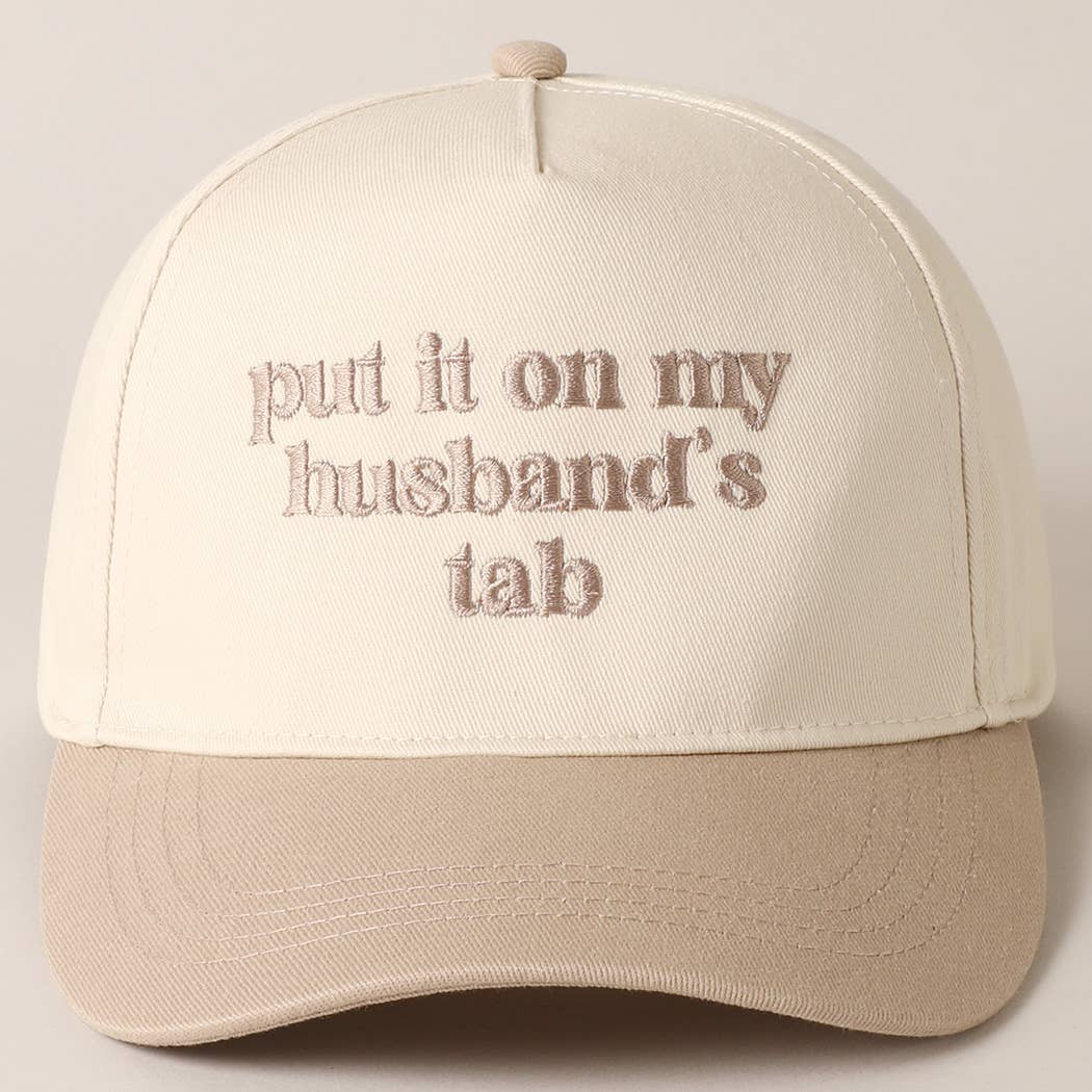 Put it on my husband's tab Trucker Hat