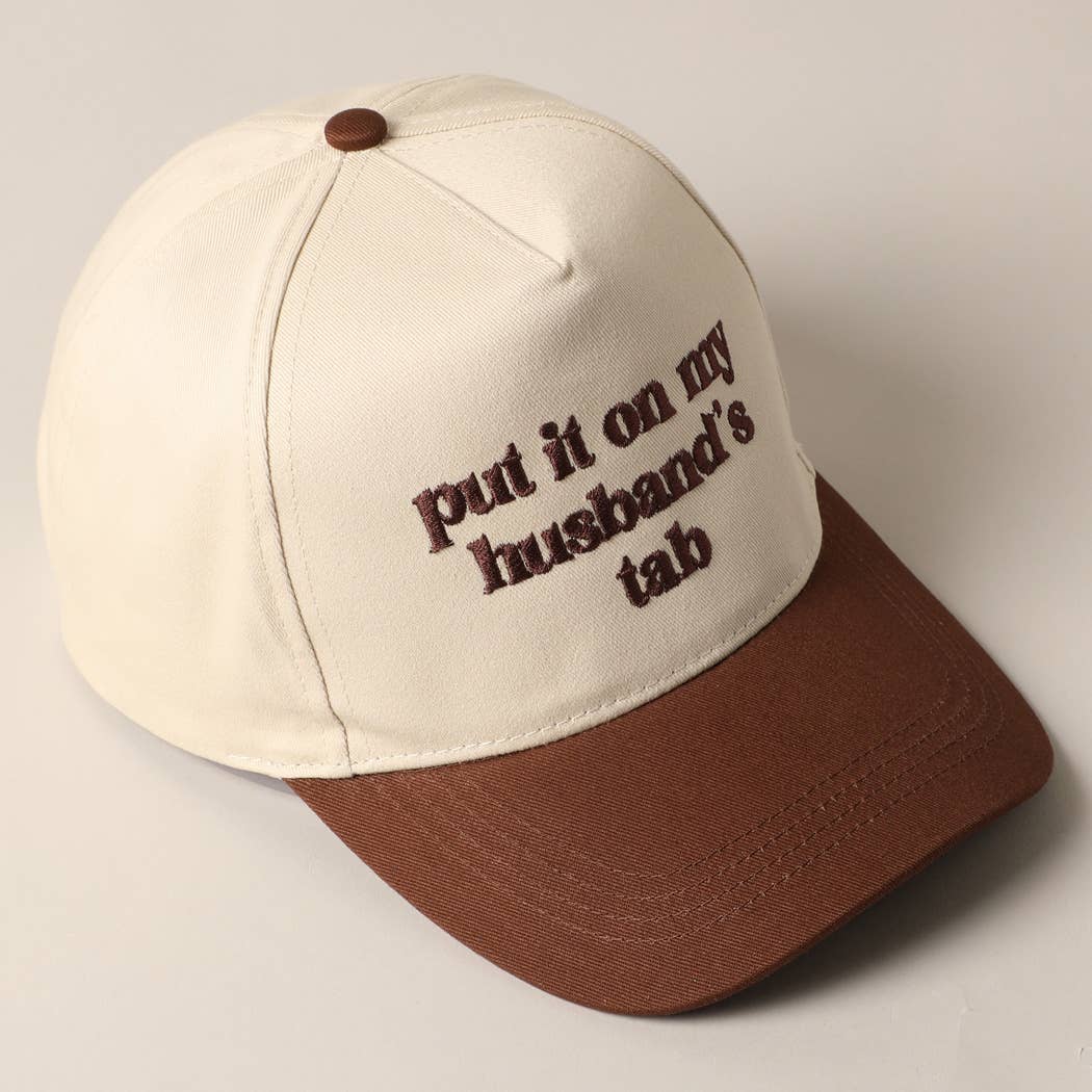 Put it on my husband's tab Trucker Hat
