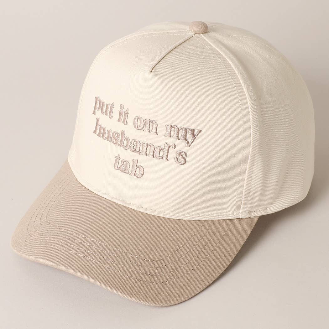 Put it on my husband's tab Trucker Hat