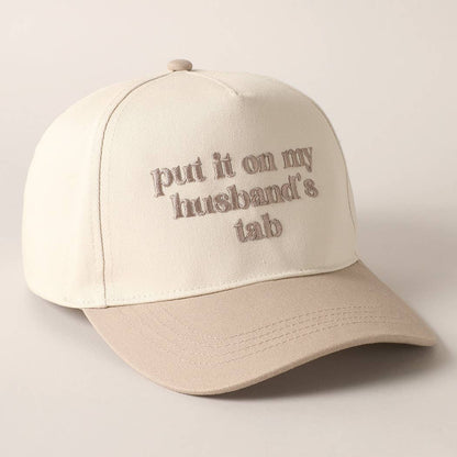 Put it on my husband's tab Trucker Hat